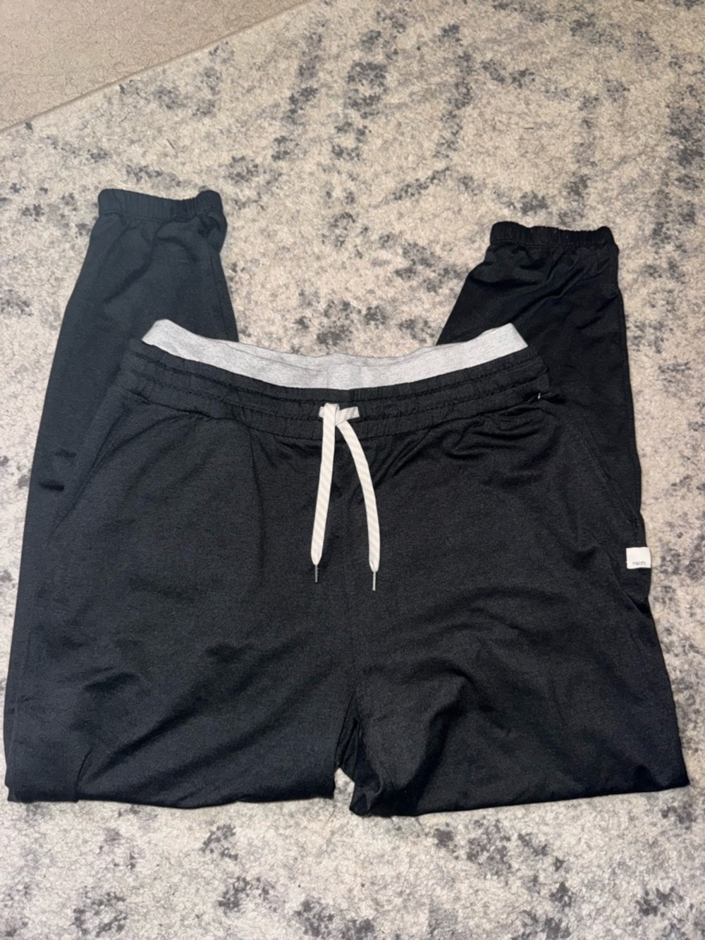 Vuori Black Jogger Pants with Gray Waistband and White Drawstring